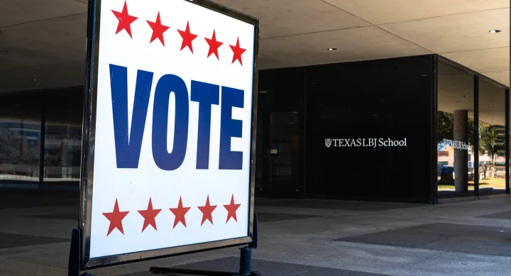 A vote sign outside of the LBJ School