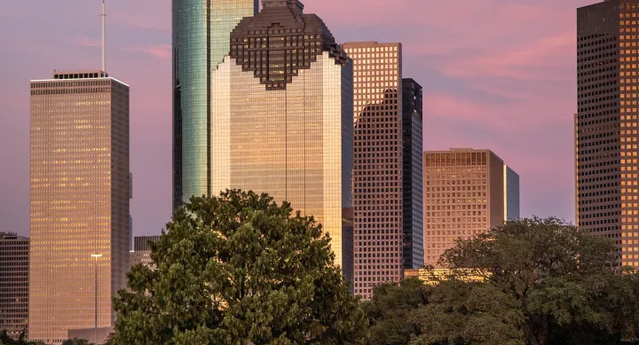 Houston skyline at sunset — credit Random Sky, Unsplash Houston skyline at sunset — credit Random Sky, Unsplash