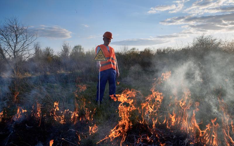 Firefighter extinguishes fire